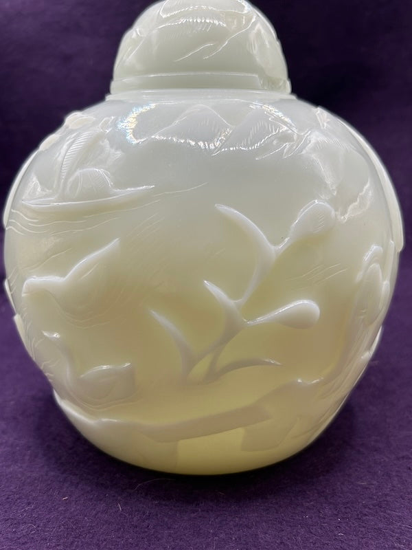 Carved Hetian White Jade ginger jar featuring intricate nature design and cloaked figure, measuring 6.375" height.