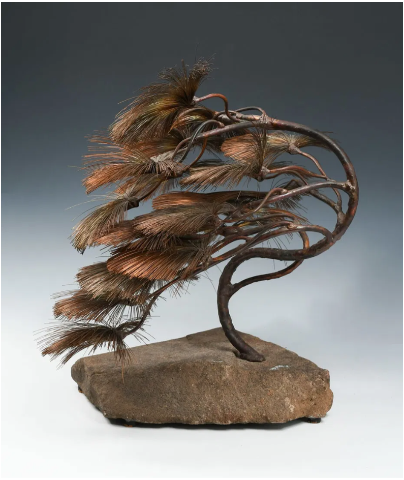 John Steck copper and stone bonsai sculpture, featuring intricate wire fronds on a natural stone base.